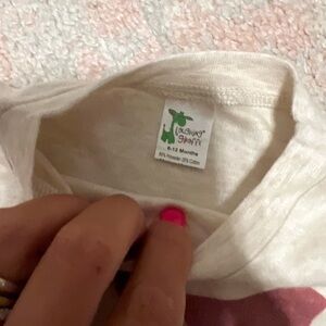 “A” long sleeve one piece jumper with buttons at bottom. 6-12 months.